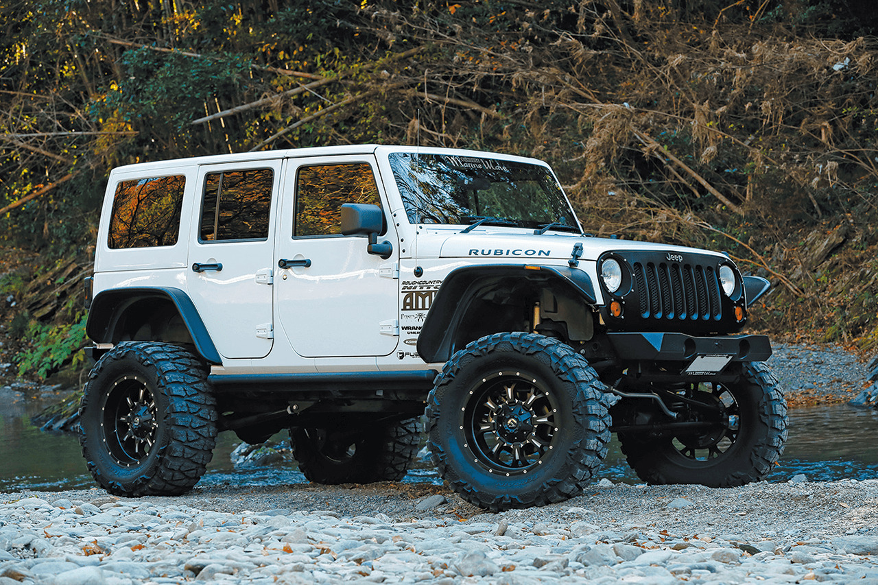 Fall leaves of Autumn Touring by Jeep JK WRANGLER UNLIMITED 88HOUSE MARINE WAVE
